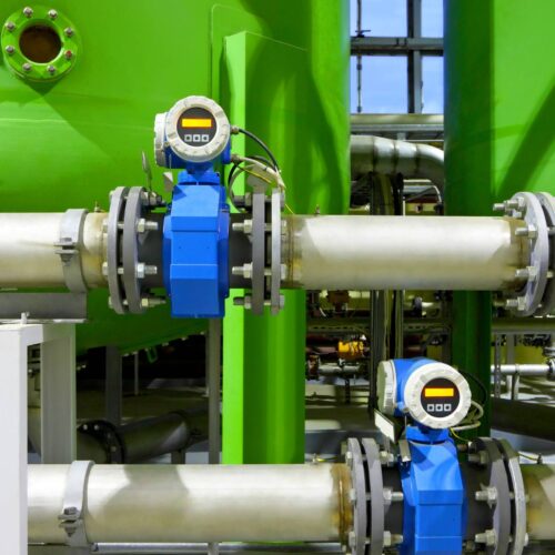 chemical factory tanks with pipes