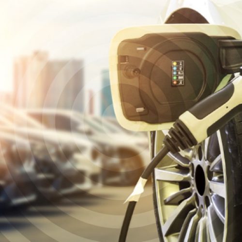 plugged in EV car charging port