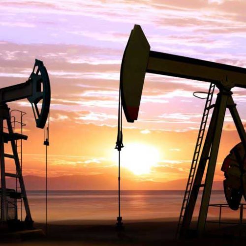 oil pumps in sunset